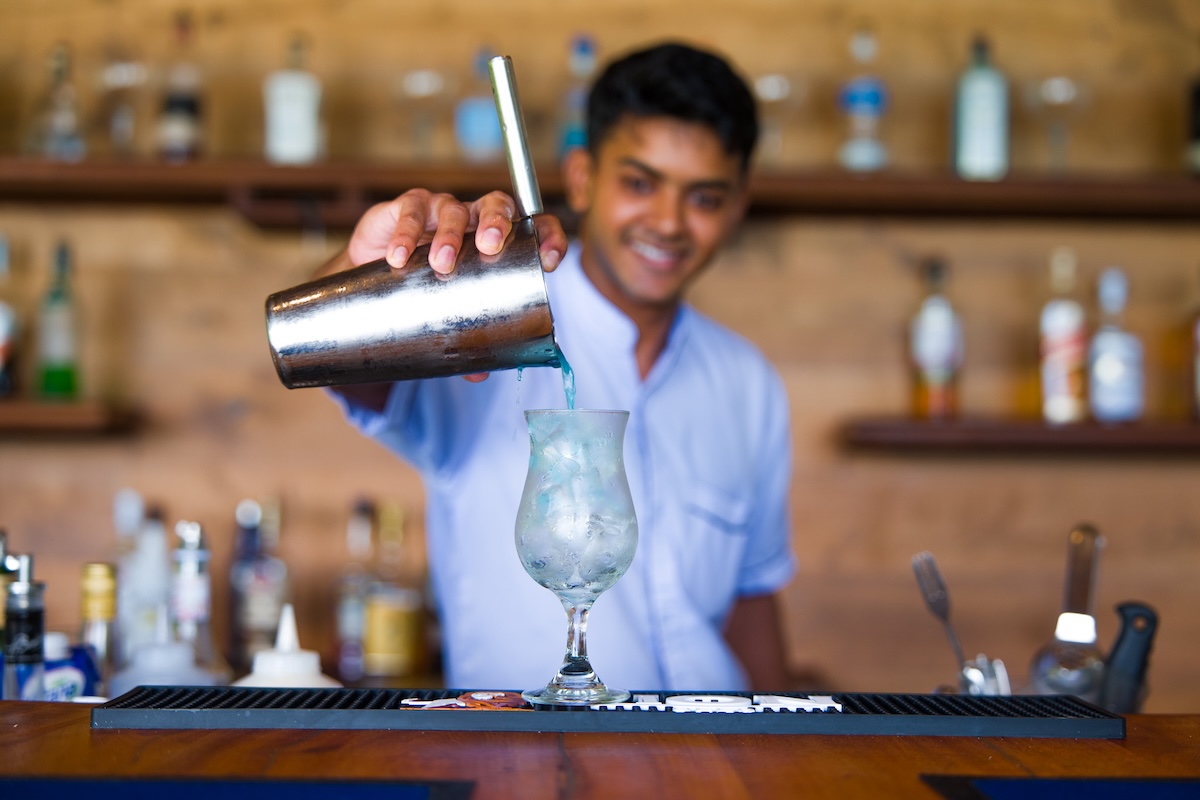 Bartender preparing a drink at Reethi Faru