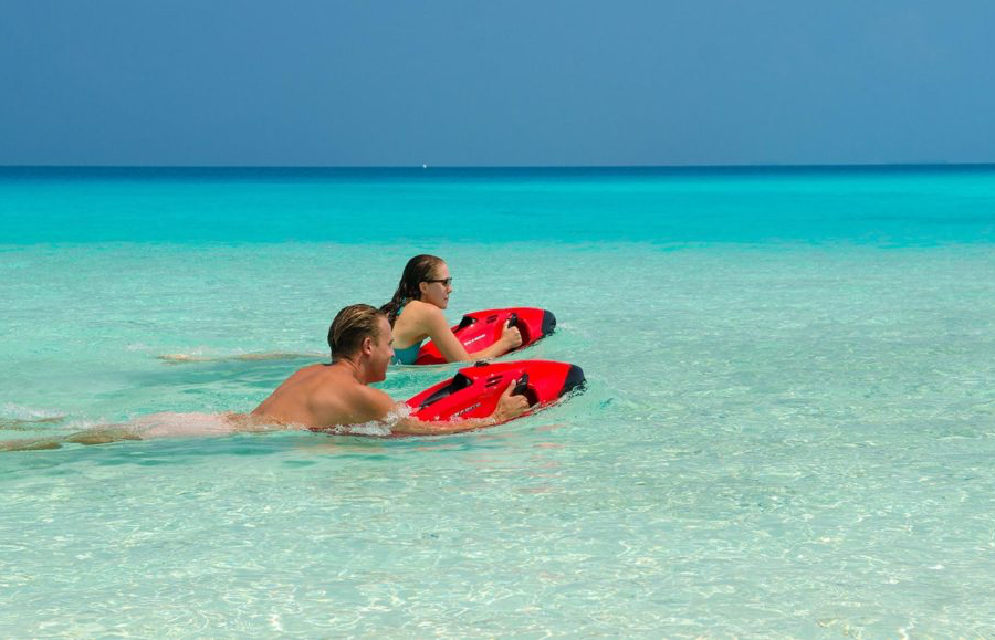 Guest using a Sea Bob in shallow turquoise water