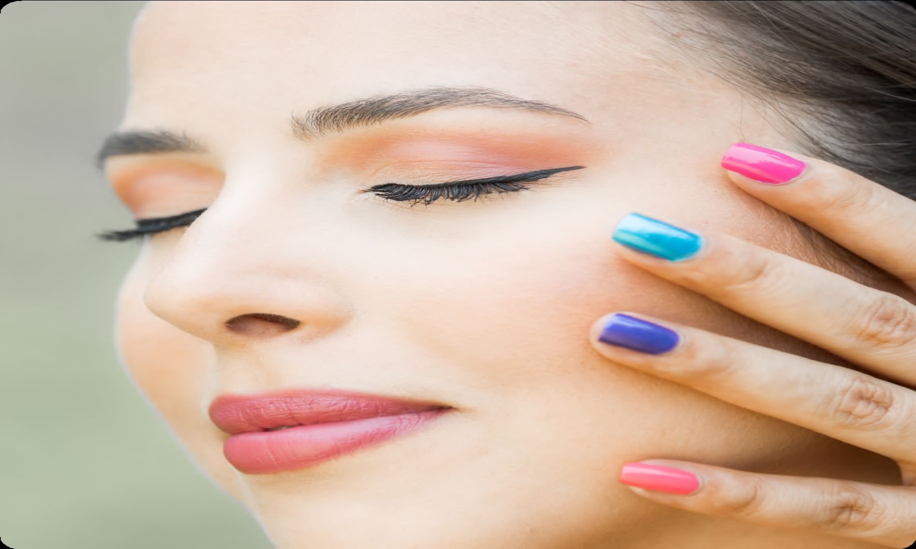 Beauty treatment with colourful manicure